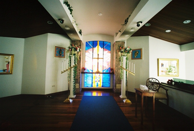 church stainglass of a cross in Hawaii 